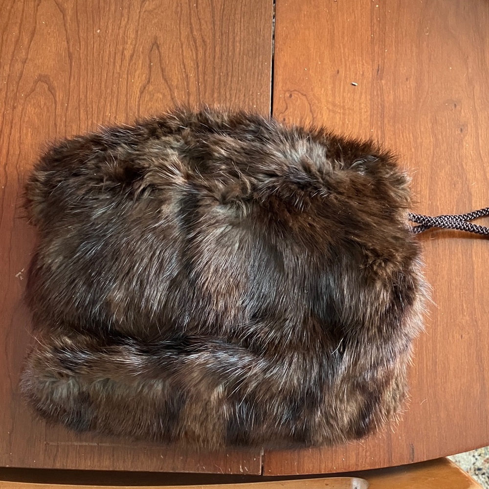 Fur (mink or fox?) hand muff with hidden zipper rope handle. Possibly vintage